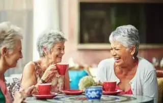 shot of a group of elderly friends having coffee together