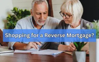 Senior couple reviewing reverse mortgage offers with advisor